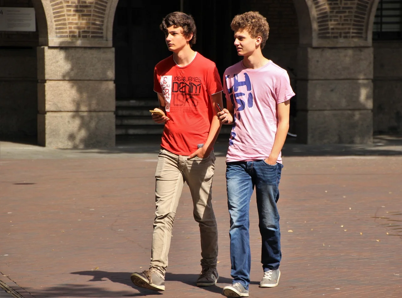 A subtle, dark, atmospheric background pattern composed of intricate, faintly glowing circuit board traces and interconnected nodes. The lines emit a soft, diffused glow in muted cyan and deep purple, suggesting a complex, intelligent system at work. The pattern is layered and slightly out of focus, providing depth without distracting from foreground content. It symbolizes connection, innovation, and integrity within a technological framework.